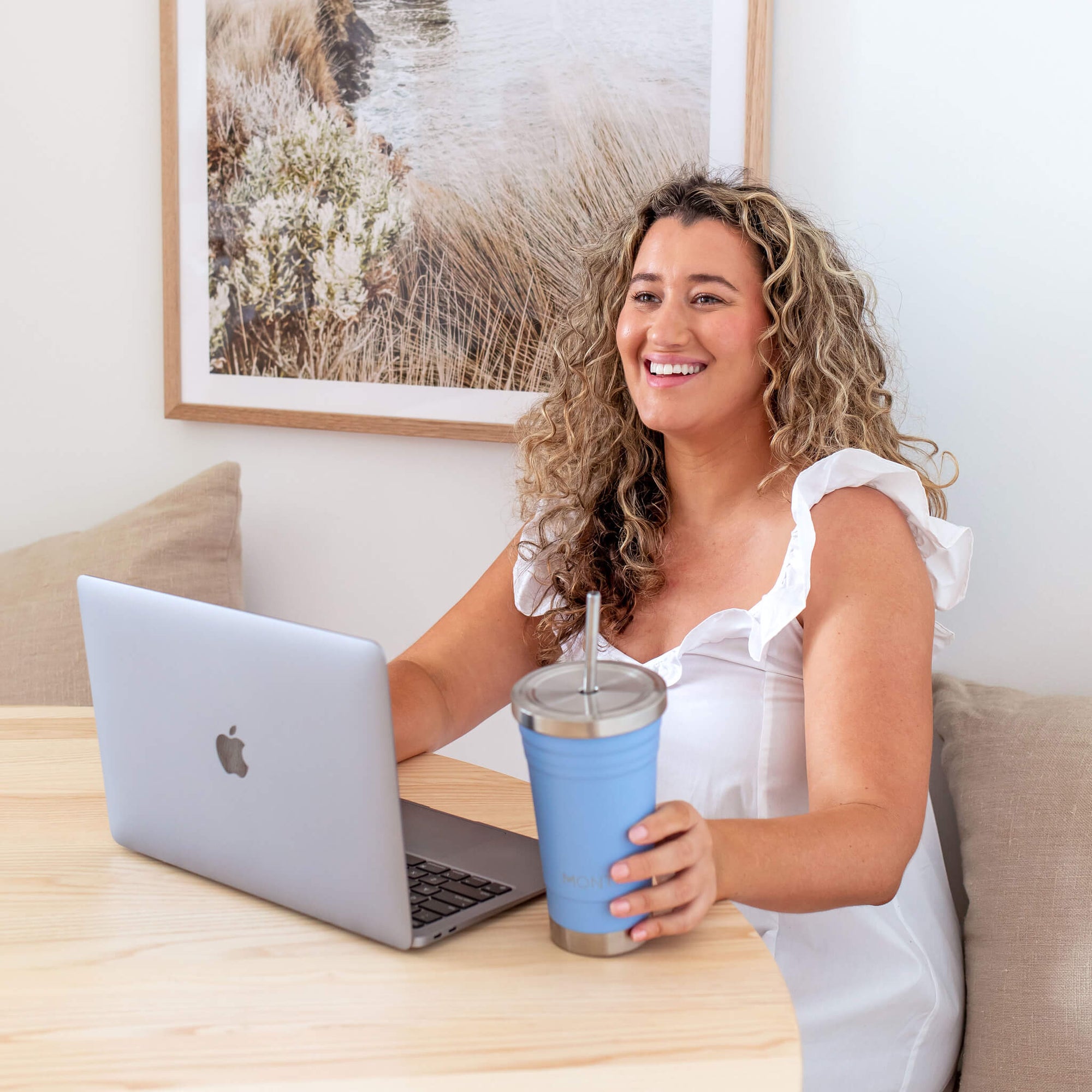 Lady working with Sky Blue smoothie cup